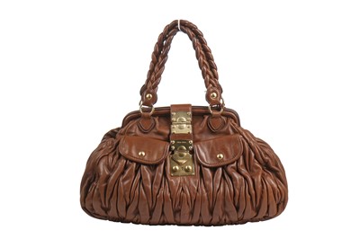 Lot 28 - A Miu Miu ruched brown leather handbag, 2000s-2010s