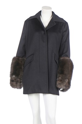 Lot 101 - A Loro Piana black cashmere coat with marten fur cuffs, modern