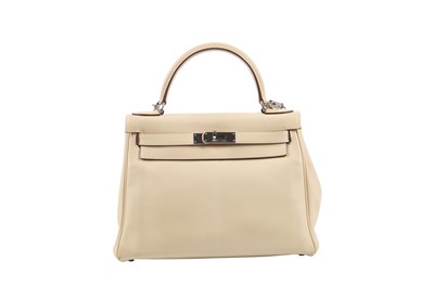 Lot 64 - An Hermès ecru leather Retourné Kelly, 2008
