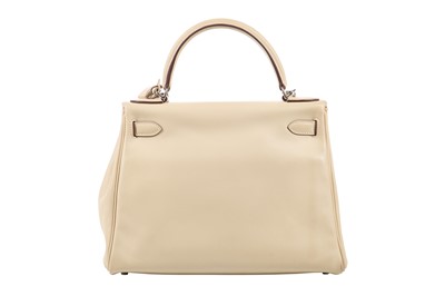 Lot 64 - An Hermès ecru leather Retourné Kelly, 2008