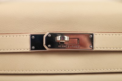 Lot 64 - An Hermès ecru leather Retourné Kelly, 2008