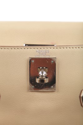 Lot 64 - An Hermès ecru leather Retourné Kelly, 2008