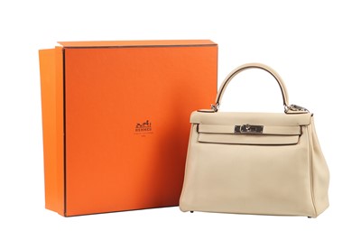 Lot 64 - An Hermès ecru leather Retourné Kelly, 2008