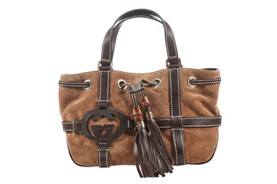 Lot 15 - A Gucci brown suede and leather handbag, late 1990s-early 2000s