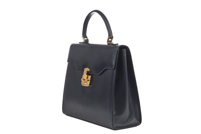 Lot 101 - A Gucci navy leather handbag, 1980s