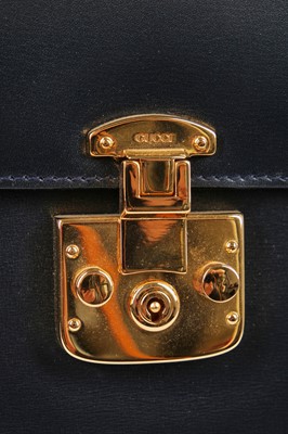 Lot 101 - A Gucci navy leather handbag, 1980s