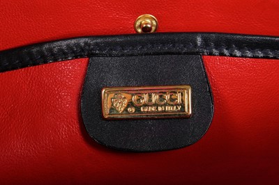Lot 101 - A Gucci navy leather handbag, 1980s