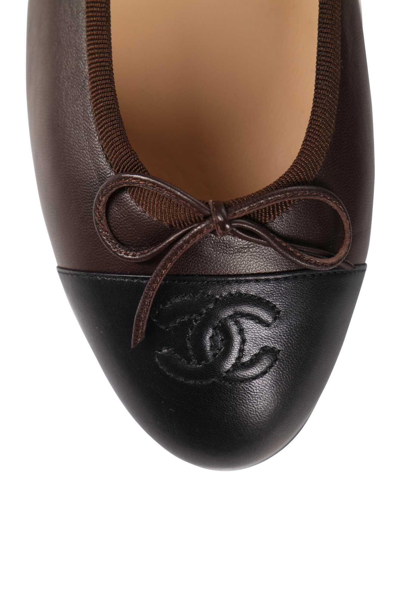 Lot 17 - Two pairs of Chanel two-tone leather ballet flats, modern
