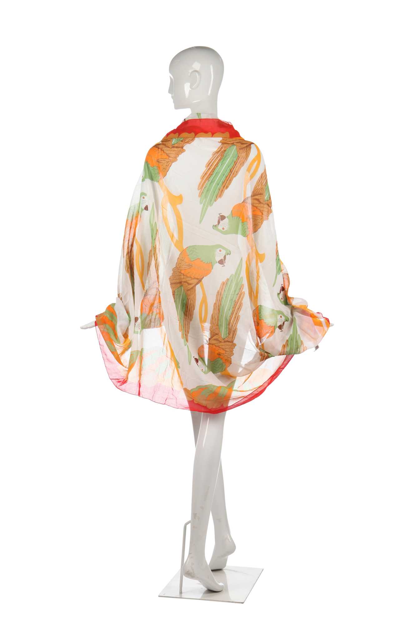 Lot 59 - An Hermès cotton sarong/shawl printed with large-scale parrots, 1980s-1990s