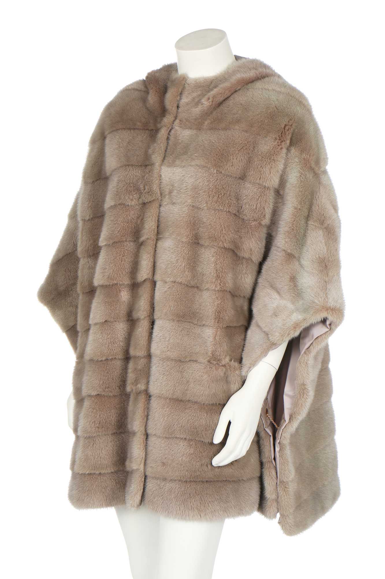 Lot 84 - A Loro Piana 'Kulm' white mink reversible poncho, modern