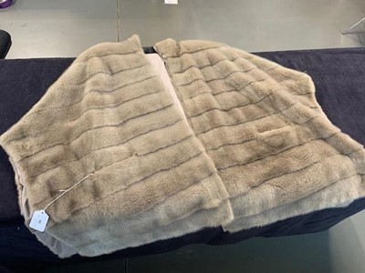 Lot 84 - A Loro Piana 'Kulm' white mink reversible poncho, modern