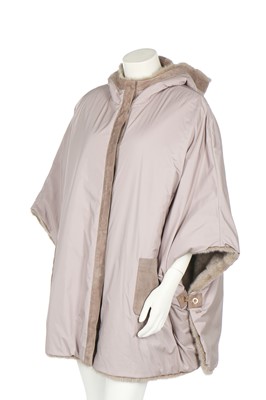 Lot 84 - A Loro Piana 'Kulm' white mink reversible poncho, modern