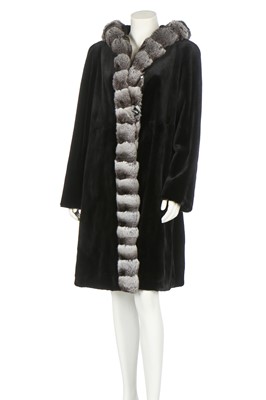 Lot 94 - A reversible evening coat of chinchilla and shaved black rabbit fur, modern