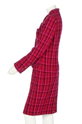 Lot 20 - A Chanel fuchsia-pink and black tweed suit, Autumn-Winter 1995-96