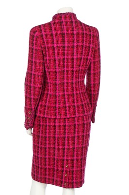 Lot 20 - A Chanel fuchsia-pink and black tweed suit, Autumn-Winter 1995-96