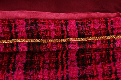 Lot 20 - A Chanel fuchsia-pink and black tweed suit, Autumn-Winter 1995-96