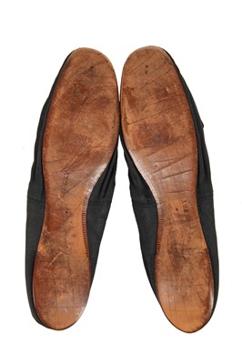 Lot 214 - Queen Victoria's stockings and shoes, late 19th century