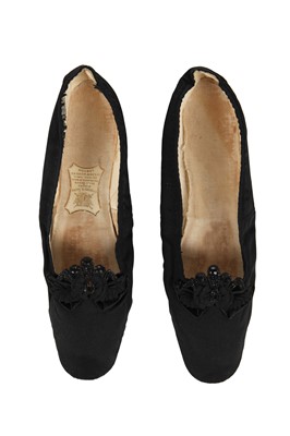 Lot 214 - Queen Victoria's stockings and shoes, late 19th century