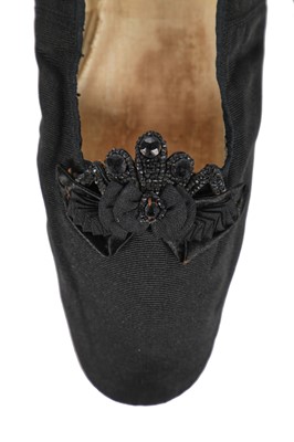 Lot 214 - Queen Victoria's stockings and shoes, late 19th century