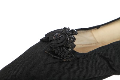 Lot 214 - Queen Victoria's stockings and shoes, late 19th century