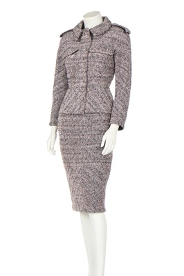 Lot 65 - A Chanel pink, black and silver bouclé wool suit, circa 2016