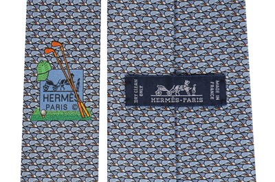 Lot 205 - Four Hermès printed silk ties, mainly in shades of blue, modern
