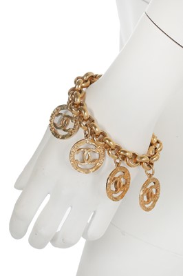Lot 45 - A Chanel gilt metal charm bracelet, Spring-Summer 1992