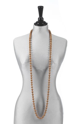 Lot 40 - A Chanel toasted-marshmallow 'pearl' sautoir, 1981