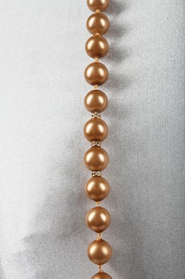 Lot 40 - A Chanel toasted-marshmallow 'pearl' sautoir, 1981