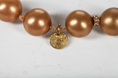 Lot 40 - A Chanel toasted-marshmallow 'pearl' sautoir, 1981