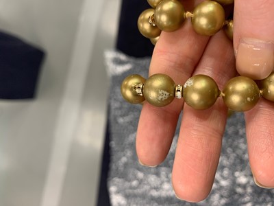 Lot 40 - A Chanel toasted-marshmallow 'pearl' sautoir, 1981