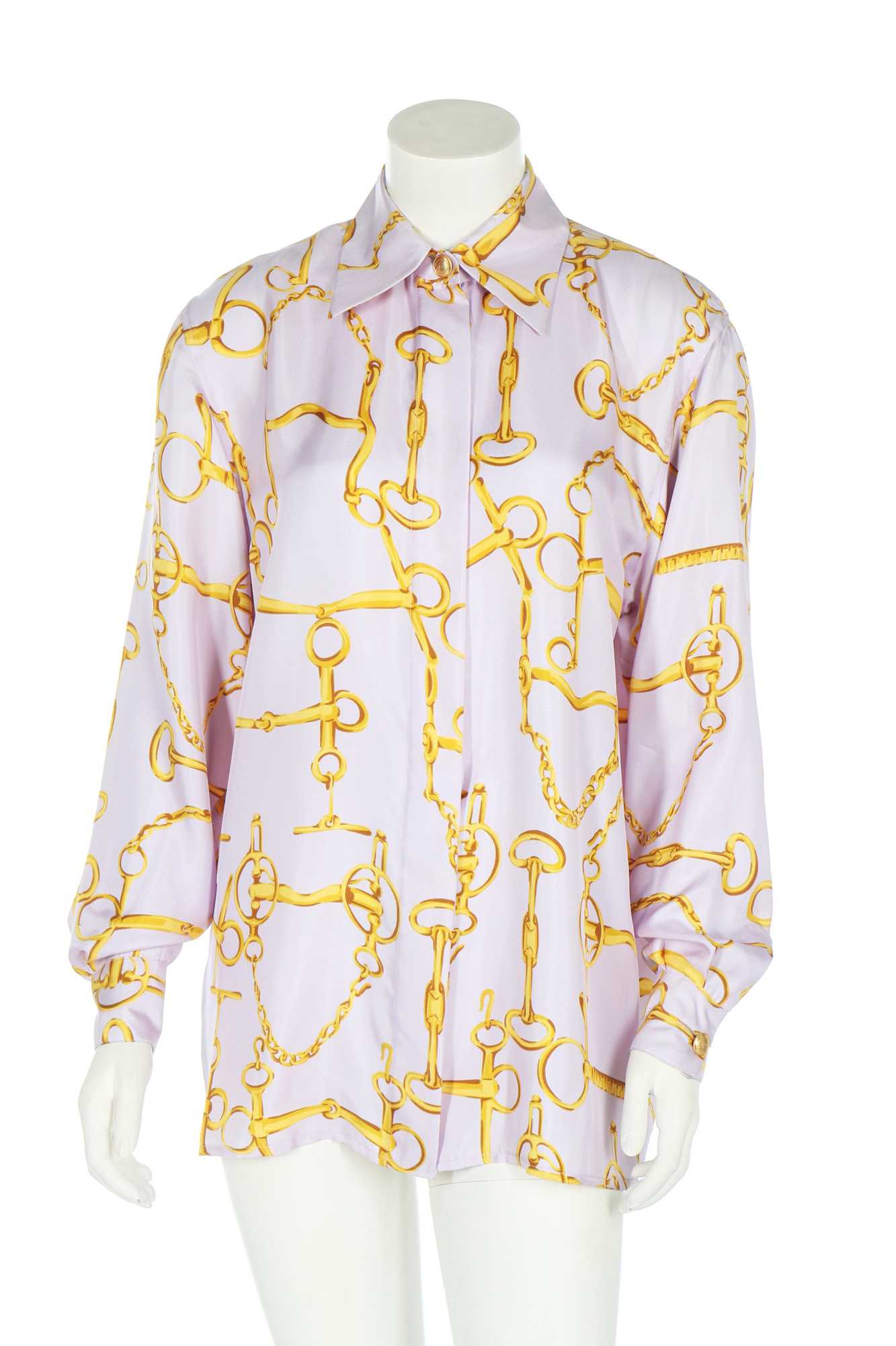 Lot 99 - A Gucci lilac silk shirt printed with horse-bit repeats, 1990s