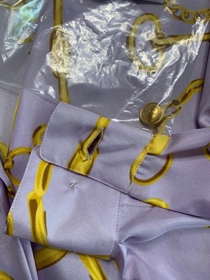 Lot 99 - A Gucci lilac silk shirt printed with horse-bit repeats, 1990s