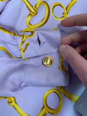 Lot 99 - A Gucci lilac silk shirt printed with horse-bit repeats, 1990s