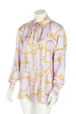Lot 99 - A Gucci lilac silk shirt printed with horse-bit repeats, 1990s