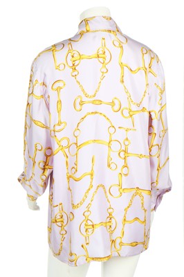 Lot 99 - A Gucci lilac silk shirt printed with horse-bit repeats, 1990s