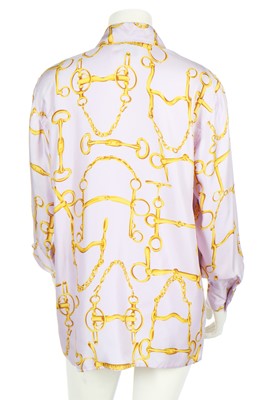 Lot 99 - A Gucci lilac silk shirt printed with horse-bit repeats, 1990s