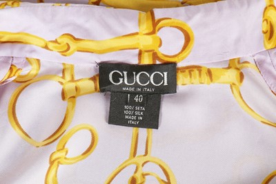 Lot 99 - A Gucci lilac silk shirt printed with horse-bit repeats, 1990s
