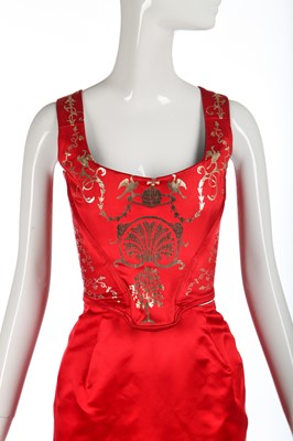 Lot 180 - A good Vivienne Westwood gold-stencilled red satin corset, probably 'Salon' collection, Spring-Summer 1992