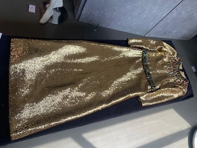 Lot 298 - A fine and rare Yves Saint Laurent couture bejewelled gold sequined dress, Autumn-Winter 1966