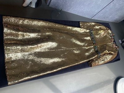 Lot 298 - A fine and rare Yves Saint Laurent couture bejewelled gold sequined dress, Autumn-Winter 1966