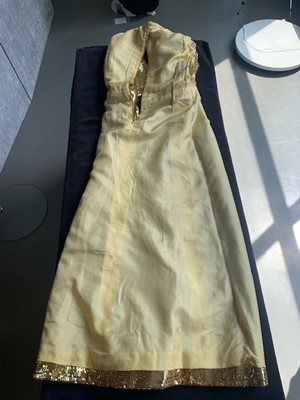 Lot 298 - A fine and rare Yves Saint Laurent couture bejewelled gold sequined dress, Autumn-Winter 1966