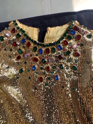 Lot 298 - A fine and rare Yves Saint Laurent couture bejewelled gold sequined dress, Autumn-Winter 1966