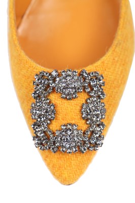 Lot 87 - A pair of Manolo Blahnik yellow tweed flats with rhinestone-encrusted buckles, modern