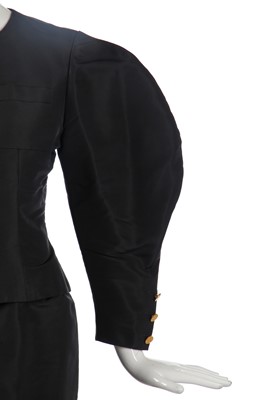 Lot 32 - A Chanel by Karl Lagerfeld black faille cocktail suit, Autumn-Winter 1988