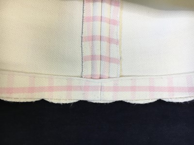 Lot 302 - A Courrèges pink and white checked mini-dress, 1968