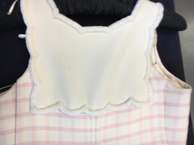Lot 302 - A Courrèges pink and white checked mini-dress, 1968