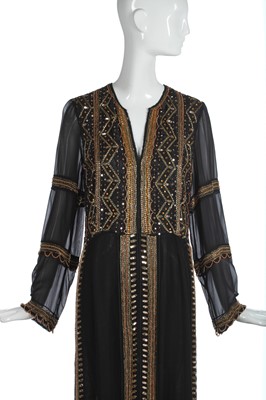 Lot 313 - A Thea Porter gold sequined and beaded black chiffon dress, circa 1974