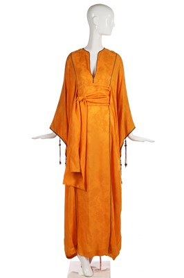 Lot 312 - A Thea Porter marigold-orange damask silk abaya, 1970s