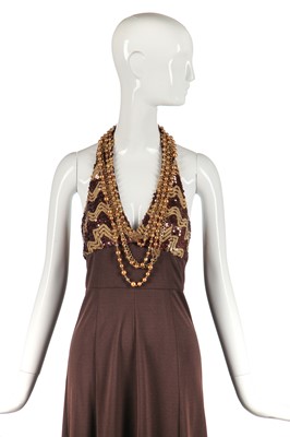 Lot 327 - Nina Baden-Semper's brown jersey dress with zig-zagged sequined halterneck bodice, 1970s